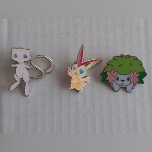 Pokémon enamel Collectible pins featuring Mew, Victini, and Shaymin Set Of Three